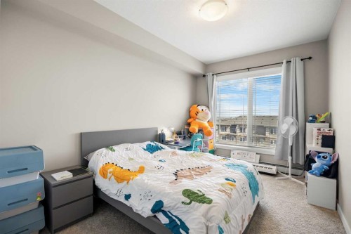 401-150 Auburn Meadows Manor Se, Calgary, AB - Indoor Photo Showing Bedroom