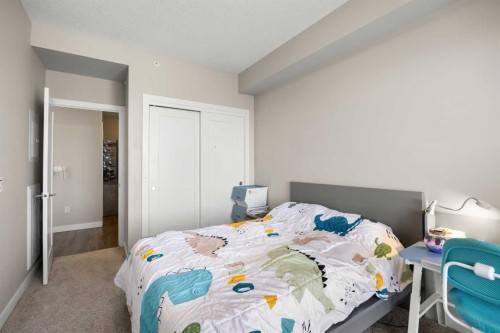 401-150 Auburn Meadows Manor Se, Calgary, AB - Indoor Photo Showing Bedroom