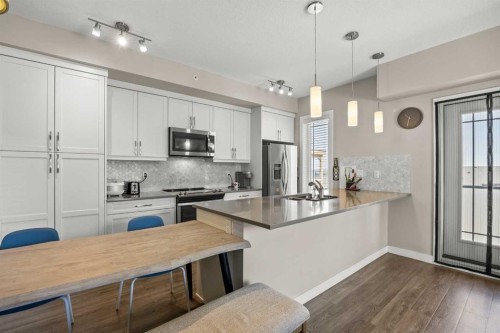 401-150 Auburn Meadows Manor Se, Calgary, AB - Indoor Photo Showing Kitchen With Stainless Steel Kitchen With Upgraded Kitchen
