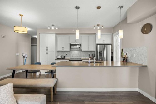 401-150 Auburn Meadows Manor Se, Calgary, AB - Indoor Photo Showing Kitchen With Upgraded Kitchen