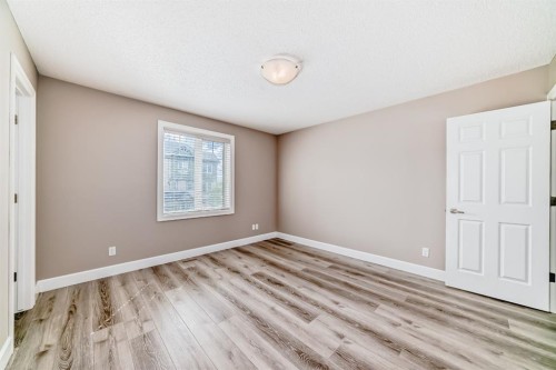 553 Windstone Common Sw, Airdrie, AB - Indoor Photo Showing Other Room
