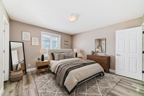 553 Windstone Common Sw, Airdrie, AB - Indoor Photo Showing Bedroom