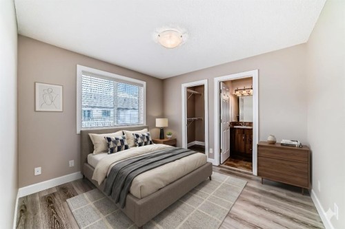 553 Windstone Common Sw, Airdrie, AB - Indoor Photo Showing Bedroom