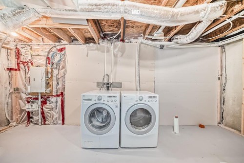 553 Windstone Common Sw, Airdrie, AB - Indoor Photo Showing Laundry Room