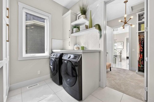 45 Cranbrook Rise Se, Calgary, AB - Indoor Photo Showing Laundry Room