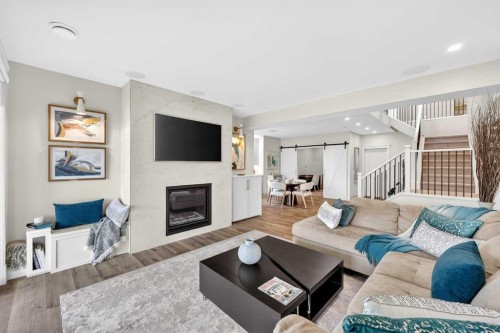 45 Cranbrook Rise Se, Calgary, AB - Indoor Photo Showing Living Room With Fireplace
