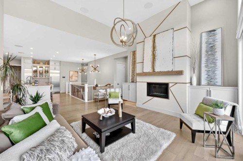 45 Cranbrook Rise Se, Calgary, AB - Indoor Photo Showing Living Room With Fireplace