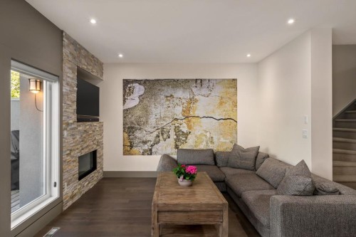 1826 37 Avenue Sw, Calgary, AB - Indoor Photo Showing Living Room With Fireplace