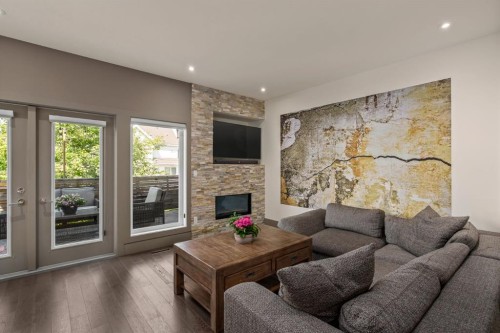 1826 37 Avenue Sw, Calgary, AB - Indoor Photo Showing Living Room With Fireplace