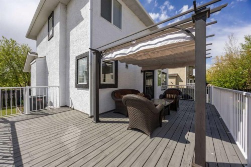 116 Cove Road, Chestermere, AB - Outdoor With Deck Patio Veranda With Exterior