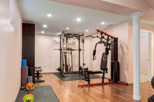 324 Evermeadow Road Sw, Calgary, AB - Indoor Photo Showing Gym Room