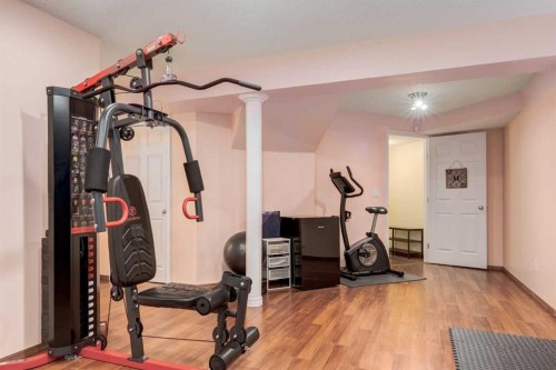 324 Evermeadow Road Sw, Calgary, AB - Indoor Photo Showing Gym Room