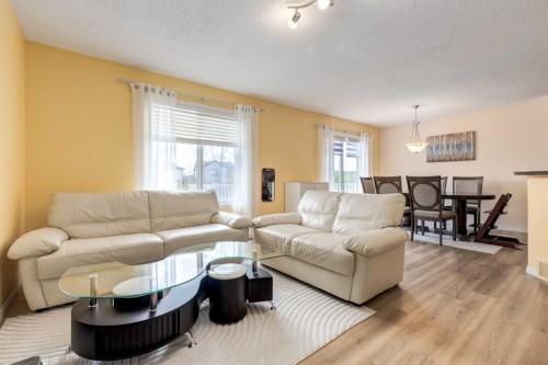 324 Evermeadow Road Sw, Calgary, AB - Indoor Photo Showing Living Room