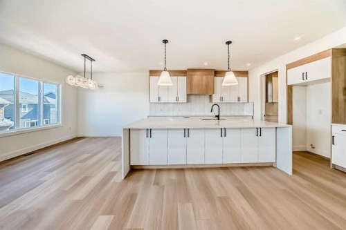 407 Rivercrest Road, Cochrane, AB - Indoor Photo Showing Kitchen With Upgraded Kitchen