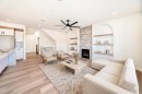 407 Rivercrest Road, Cochrane, AB  - Indoor Photo Showing Living Room With Fireplace 