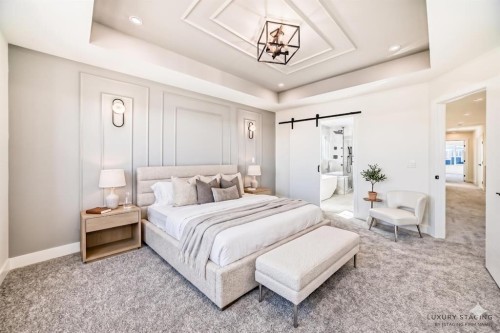 407 Rivercrest Road, Cochrane, AB - Indoor Photo Showing Bedroom