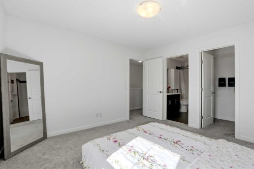 314 Auburn Crest Way Se, Calgary, AB - Indoor Photo Showing Bedroom