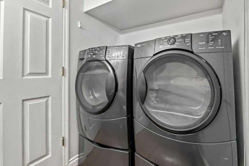 145 Harvest Glen Way Ne, Calgary, AB - Indoor Photo Showing Laundry Room