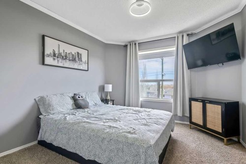 145 Harvest Glen Way Ne, Calgary, AB - Indoor Photo Showing Bedroom