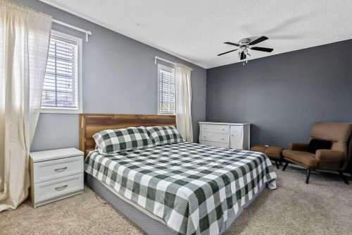 145 Harvest Glen Way Ne, Calgary, AB - Indoor Photo Showing Bedroom