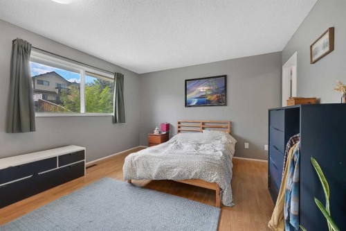 160 Strathcona Close Sw, Calgary, AB - Indoor Photo Showing Bedroom