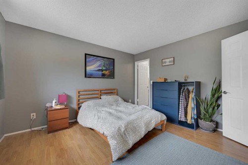 160 Strathcona Close Sw, Calgary, AB - Indoor Photo Showing Bedroom