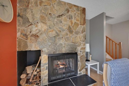 160 Strathcona Close Sw, Calgary, AB - Indoor With Fireplace