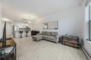 404-207 Sunset Drive, Cochrane, AB  - Indoor Photo Showing Living Room 