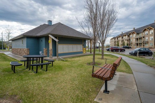 404-207 Sunset Drive, Cochrane, AB - Outdoor
