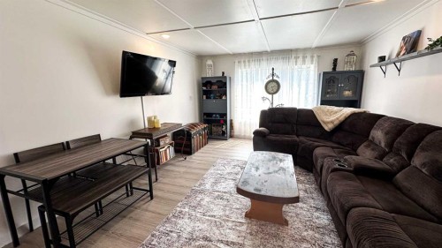 968 1 Avenue Ne, Sundre, AB - Indoor Photo Showing Living Room