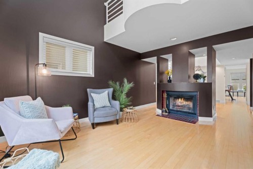 216 4 Avenue Ne, Calgary, AB - Indoor Photo Showing Living Room With Fireplace