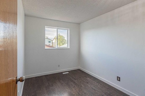 14 Martindale Mews Ne, Calgary, AB - Indoor Photo Showing Other Room