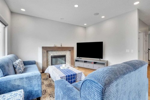 148 Savanna Close Ne, Calgary, AB - Indoor Photo Showing Living Room With Fireplace