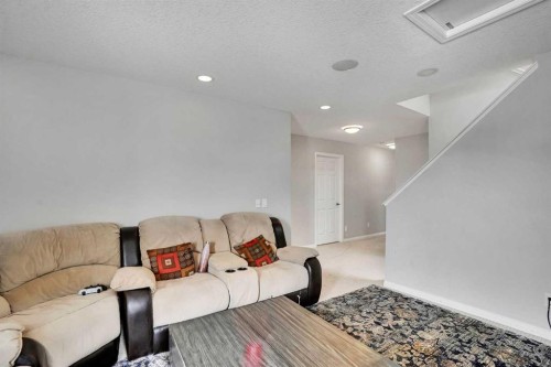 148 Savanna Close Ne, Calgary, AB - Indoor Photo Showing Living Room