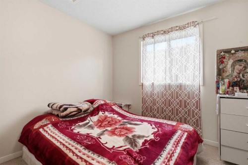 4 Panton Road Nw, Calgary, AB - Indoor Photo Showing Bedroom