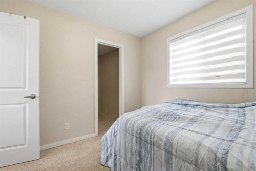 4 Panton Road Nw, Calgary, AB - Indoor Photo Showing Bedroom