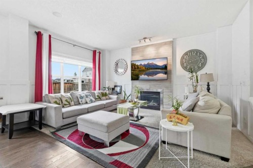 4 Panton Road Nw, Calgary, AB - Indoor Photo Showing Living Room With Fireplace