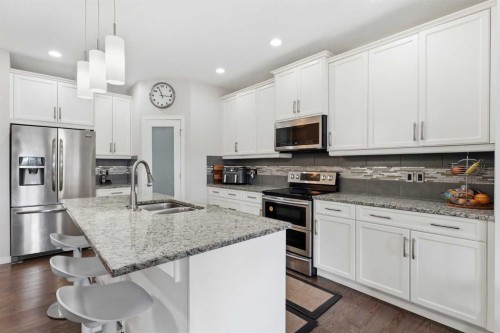 4 Panton Road Nw, Calgary, AB - Indoor Photo Showing Kitchen With Double Sink With Upgraded Kitchen