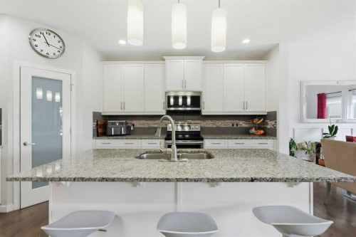 4 Panton Road Nw, Calgary, AB - Indoor Photo Showing Kitchen With Double Sink With Upgraded Kitchen