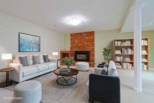 175 Brabourne Road Sw, Calgary, AB - Indoor Photo Showing Living Room With Fireplace