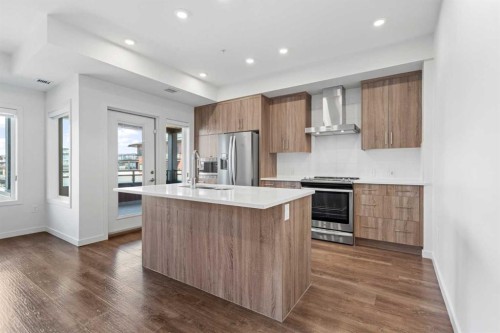 401-24 Mahogany Path Se, Calgary, AB - Indoor Photo Showing Kitchen With Stainless Steel Kitchen With Upgraded Kitchen
