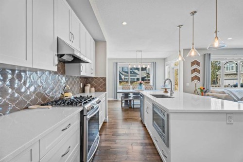 19 Masters Mews Se, Calgary, AB - Indoor Photo Showing Kitchen With Upgraded Kitchen