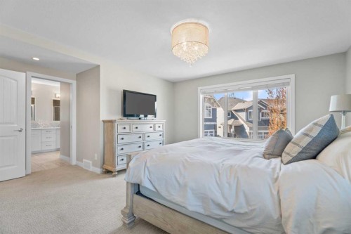 19 Masters Mews Se, Calgary, AB - Indoor Photo Showing Bedroom