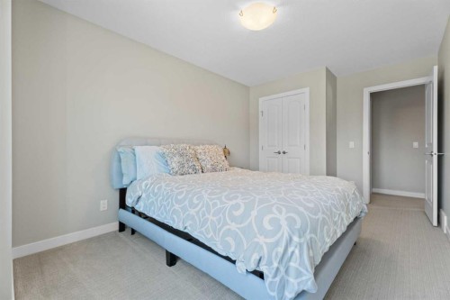 19 Masters Mews Se, Calgary, AB - Indoor Photo Showing Bedroom