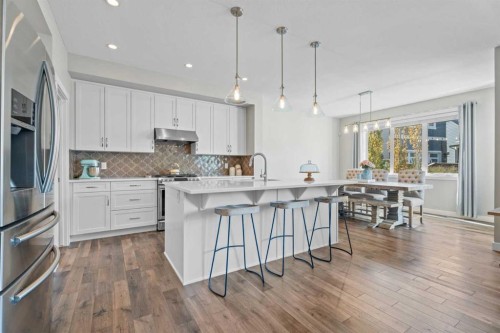 19 Masters Mews Se, Calgary, AB - Indoor Photo Showing Kitchen With Upgraded Kitchen