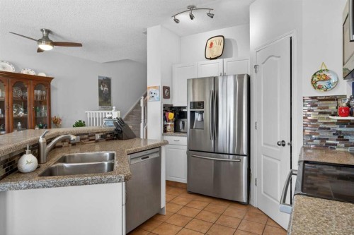 92 Hamptons Link Nw, Calgary, AB - Indoor Photo Showing Kitchen With Stainless Steel Kitchen With Double Sink
