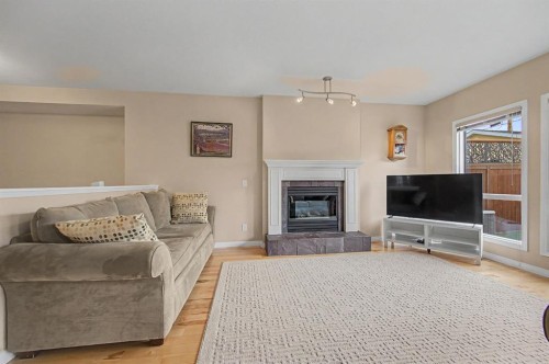 1206 19 Avenue Nw, Calgary, AB - Indoor Photo Showing Living Room With Fireplace
