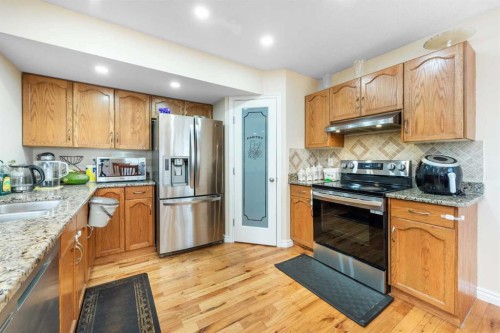 138 Panamount Crescent Nw, Calgary, AB - Indoor Photo Showing Kitchen With Stainless Steel Kitchen