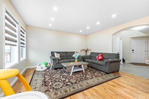 138 Panamount Crescent Nw, Calgary, AB - Indoor Photo Showing Living Room