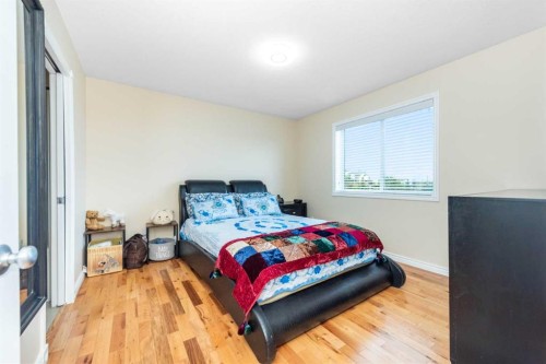 138 Panamount Crescent Nw, Calgary, AB - Indoor Photo Showing Bedroom